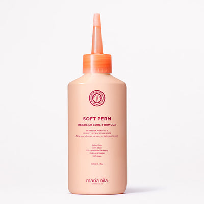 Bottle of Soft Perm Regular Curl Formula on white background
